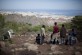 Inmigrantes subsaharianos observan Melilla desde la Montaña Gurugu en Marruecos.