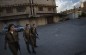 Patrulla militar israelí en un asentamiento judío en el centro de la ciudad de Hebron. 