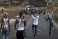Enfrentamiento entre palestinos y fuerzas de ocupación israelíes en  el checkpoint de Bayt Furik, Nablus.